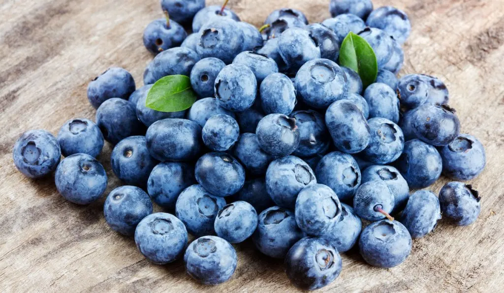 blueberries on wooden table